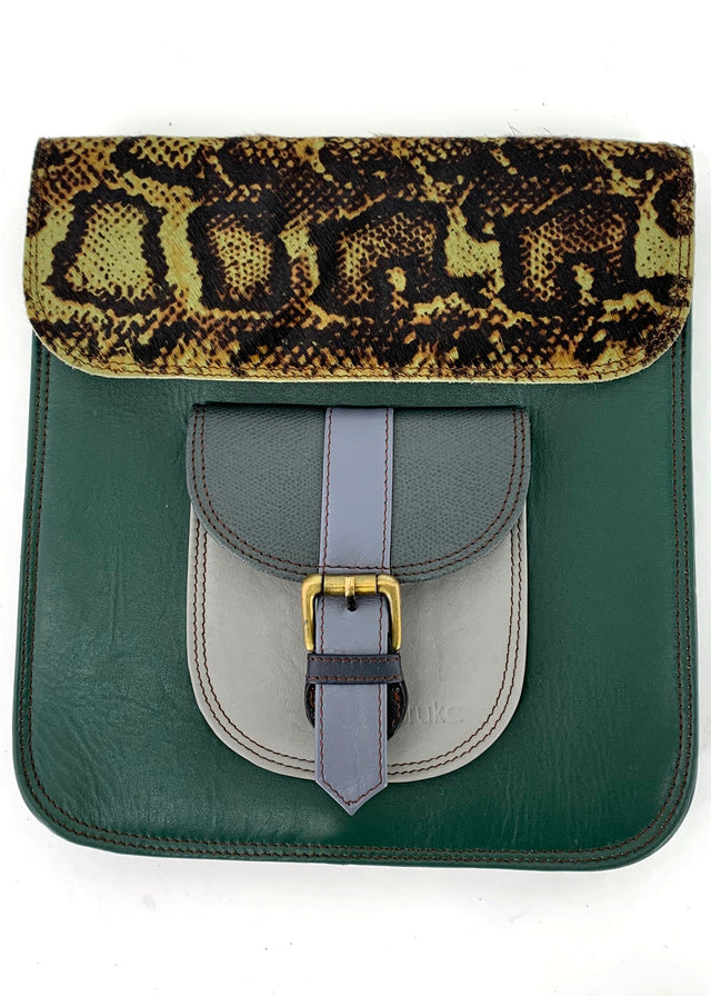 Remi animal print backpack in Fairtrade recycled leather