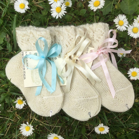 Calza neonato con fiocco in alpaca