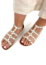 White women's sandals with natural leather studs