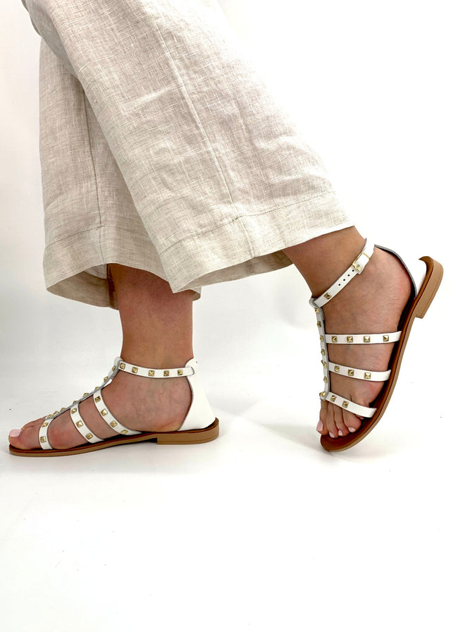 White women's sandals with natural leather studs