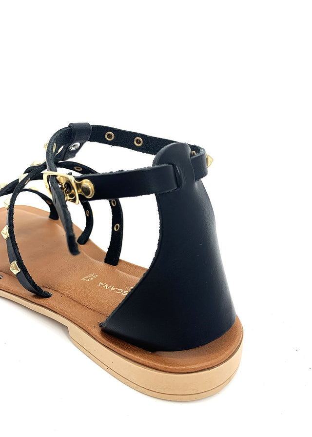 Black women's sandals in natural leather with studs