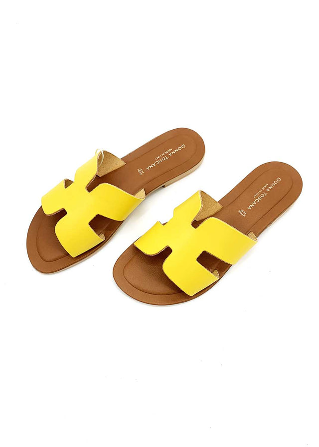 Elegant yellow H slippers for women in natural leather