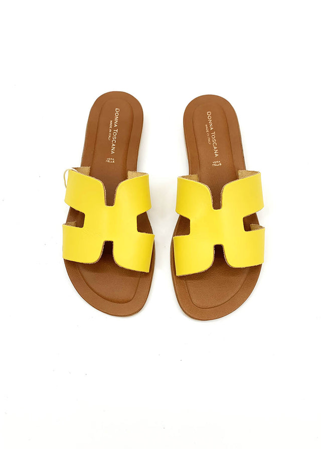 Elegant yellow H slippers for women in natural leather